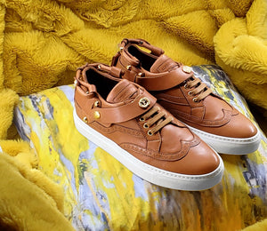 cali 02 low top in whiskey colorway on pillow with yellow fur